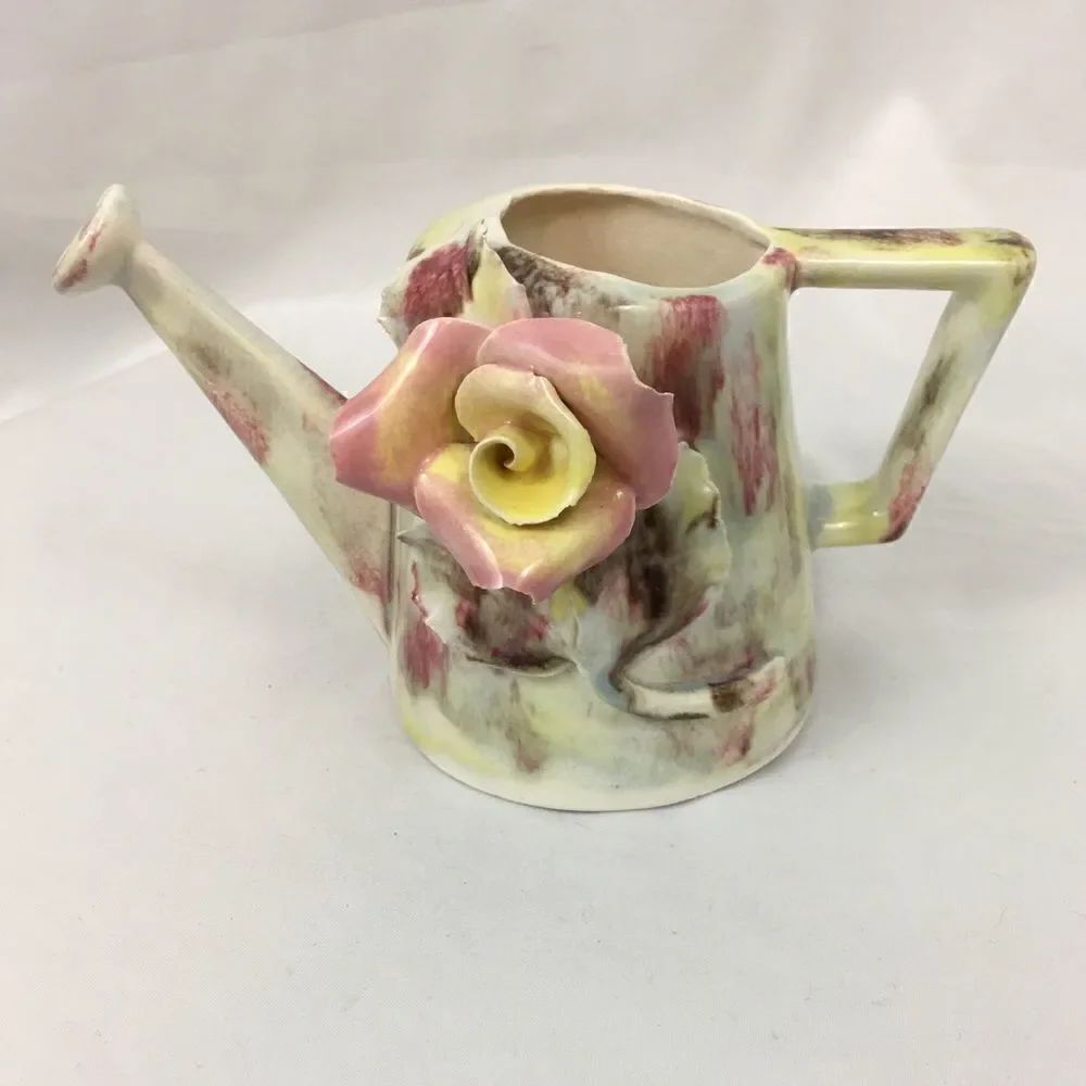 Ceramic watering can